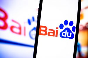 Baidu logo in a mobile phone and laptop